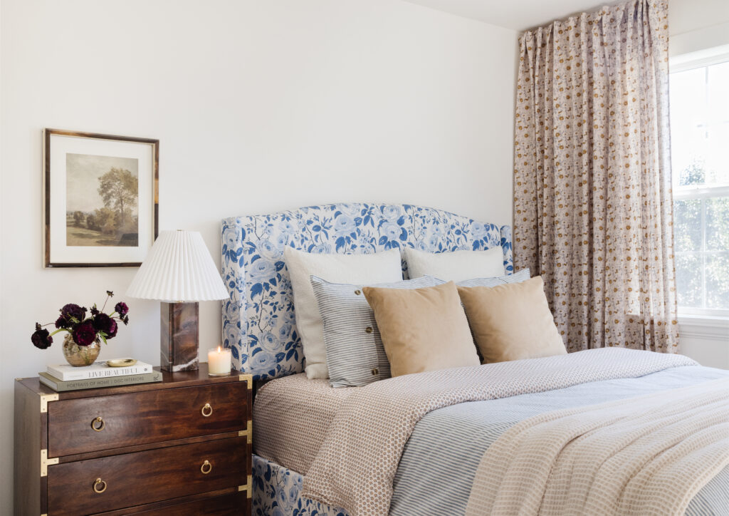 Brown chest with The Inside's Classic Wingback Bed in Delft Chintz